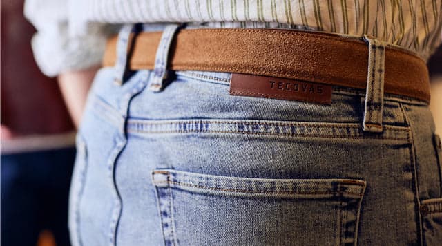 jeans and sued belt close up
